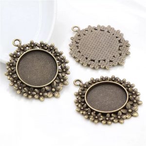 Base de bronce camafeo FLORES  1u