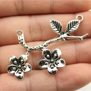 Conector de flores plata