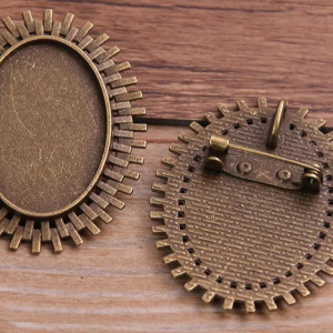 Hermoso prendedor  de color bronce 1 u