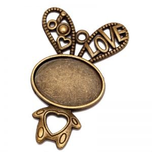 Hermosa base camafeo de bronce forma CONEJO    1 u