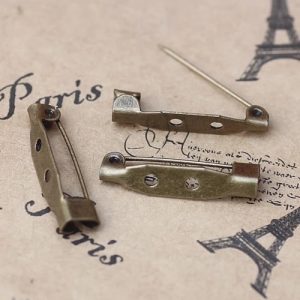 BROCHES  vintage color bronce          2 unidades