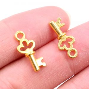 Pequeñas llaves doradas modelo: 2   para diseños steampunk   10u
