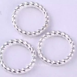 Argollas  de   PLATEADAS  cerradas anillo giratorio de 8mm    100u