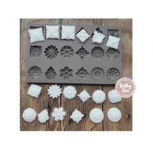 Gran Molde de silicona con 18 diseños MINI MOLDURAS.  1u