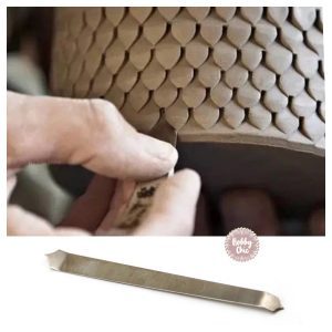 Cuchilla para  realizar escamas de pescado   1u